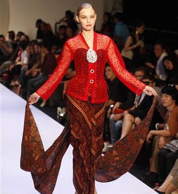 A model presents a creation by designer Zainal Rahman during the Malaysia International Fashion Week in Kuala Lumpur.