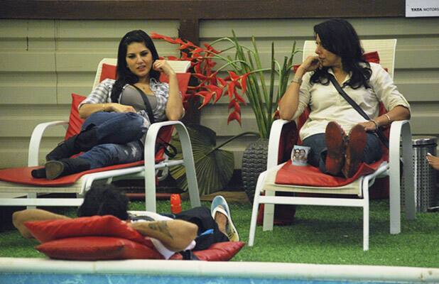 Sunny Leone of Canada speaks with Pooja Bedi, right, and another participant on the sets of Indian reality television show Bigg Boss 5.