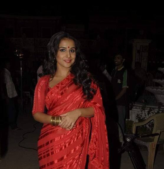 Vidya in a sultry red saree look promoting her forthcoming film 'The Dirty Picture'.