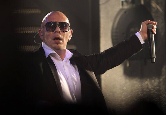 American rapper Pitbull performs at a club in Noida. Pitbull is also scheduled to perform later in the day in Mumbai and in Pune on Dec. 4. 