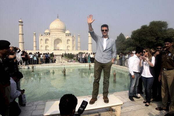 Hollywood star Tom Cruise poses in front of the landmark Taj Mahal in Agra. Cruise is in the country on a promotional tour of his new film 