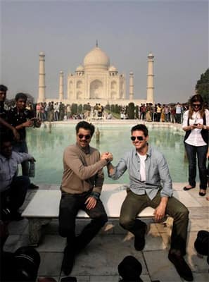 Hollywood star Tom Cruise poses in front of the landmark Taj Mahal along with co-star Anil Kapoor in Agra. Cruise is in the country on a promotional tour of his new film 