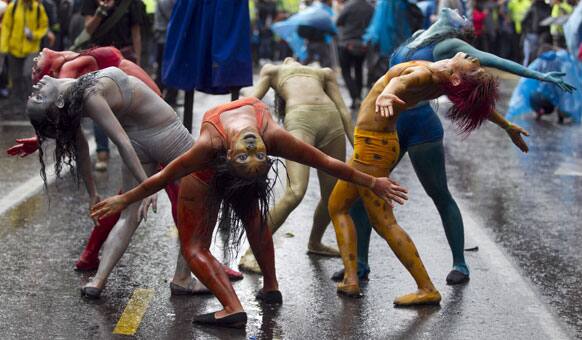 Dancers perform in the inaugural parade marking the 13th IberoAmerican Festival of Theater (FITB) in Bogota.