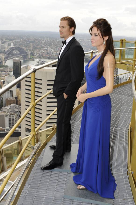 Wax figures of actors Brad Pitt and Angelina Jolie are displayed on the Skywalk deck of Sydney Tower in Australia.