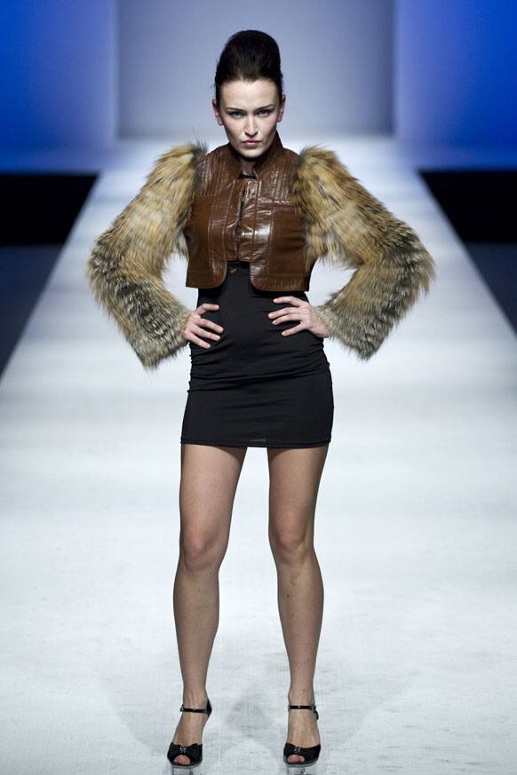 A model presents a creation from PULAIMU's 2012-2013 autumn/winter collection during China Fashion Week.