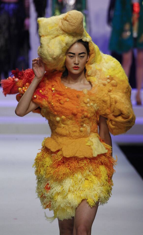 A model presents a creation at the BIFT Graduates Show 2012 held during China Fashion Week in Beijing.