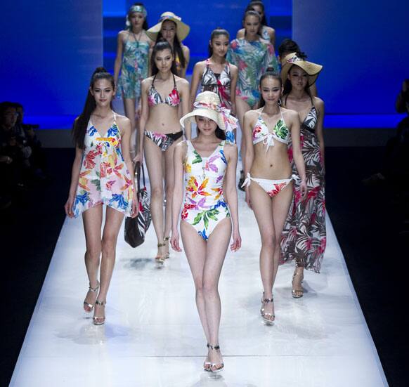 Models present creations at 2012 HOSA Swimwear Trend Fashion Show during the China Fashion Week.