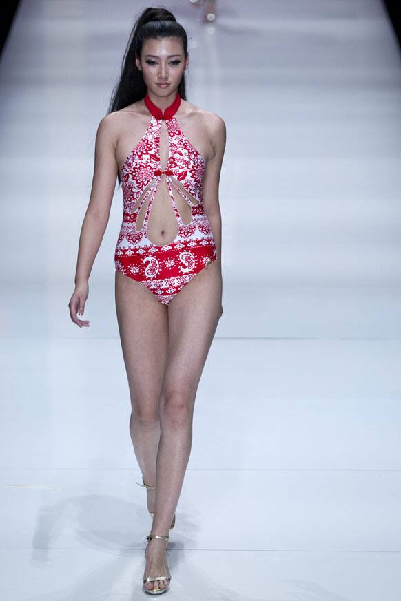 A model presents a creation at 2012 HOSA Swimwear Trend Fashion Show during the China Fashion Week.