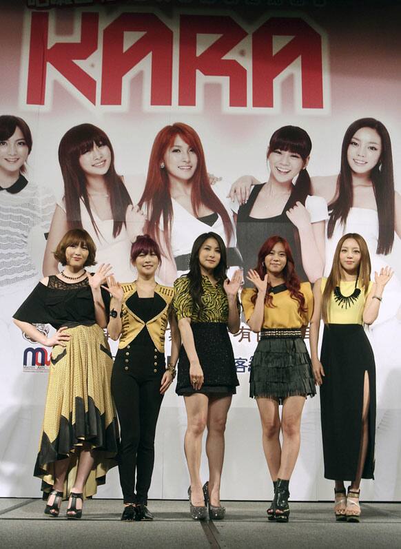 South Korean girl pop group Kara pose during a press event for announcing their fans meeting in Taipei.