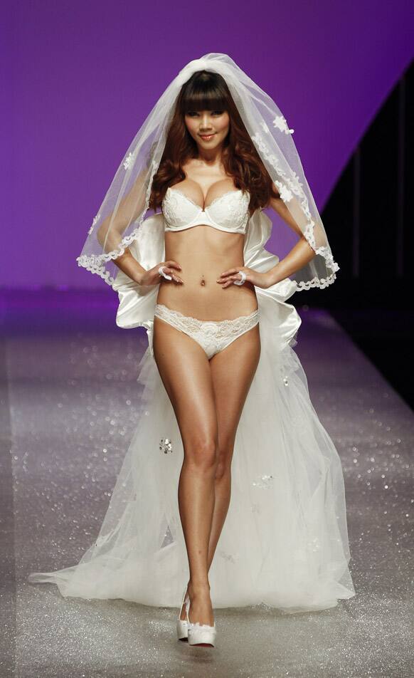 A model presents a creation from EVE'S Temptation Lingerie Collection 2012 during China Fashion Week in Beijing.