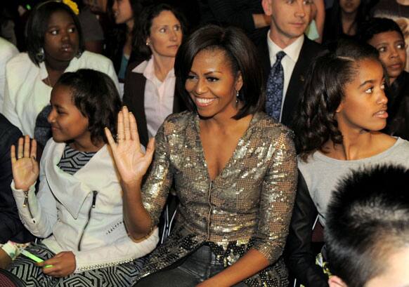 From left, Sasha Obama, first lady Michelle Obama and Malia Obama attend Nickelodeon's 25th Annual Kids' Choice Awards.