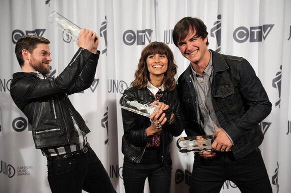 Martin Solveig, left, and Dragonette pose with the Juno for the Dance Recording of the Year for 'Hello' during the Juno Awards in Ottawa.