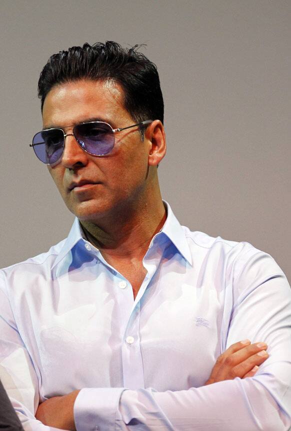 Bollywood actor Akshay Kumar listens during a press conference for Bollywood's new film Housefull 2 which makes its world premiere in Singapore. 