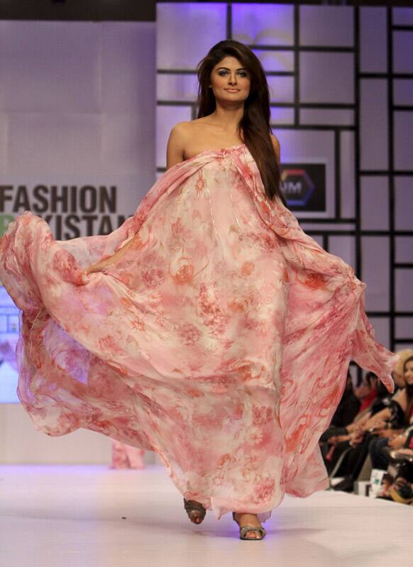 A Pakistani model presents a creation by Ayesha-Somaya Design Studio, during Fashion Week, in Karachi.