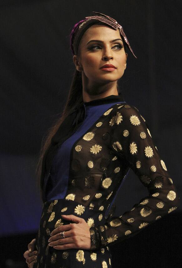 A Pakistani model presents a creation by Pakistani designer Sanam Agha during Fashion Week in Karachi.