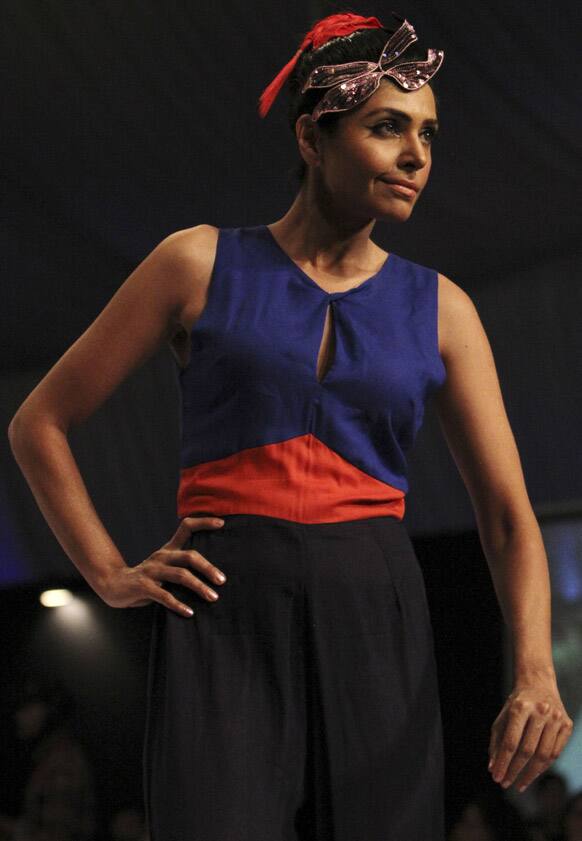 A Pakistani model presents a creation by Pakistani designer Sanam Agha during Fashion Week in Karachi.