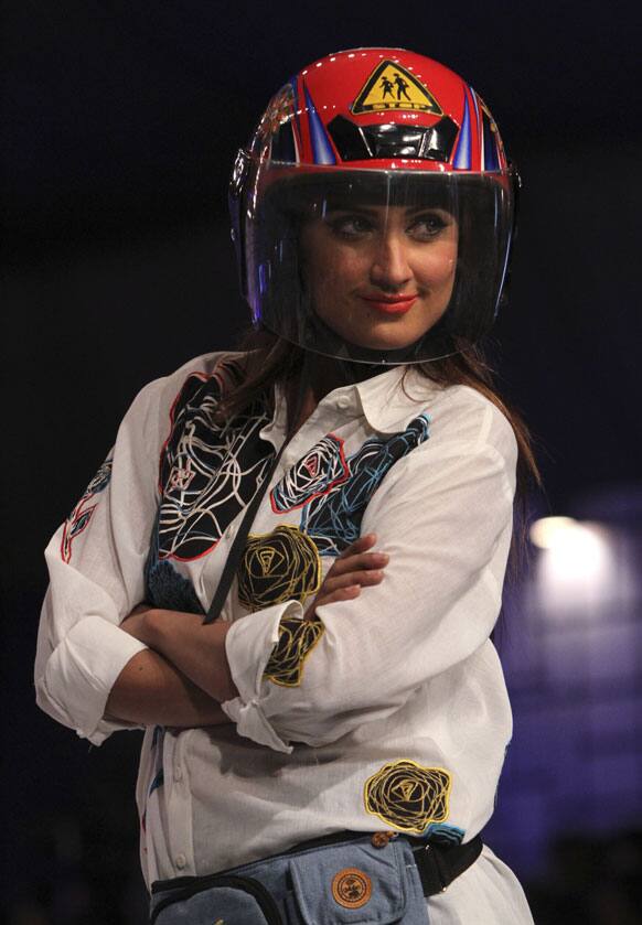 A Pakistani model presents a creation Gulabo, during Fashion Week, in Karachi.