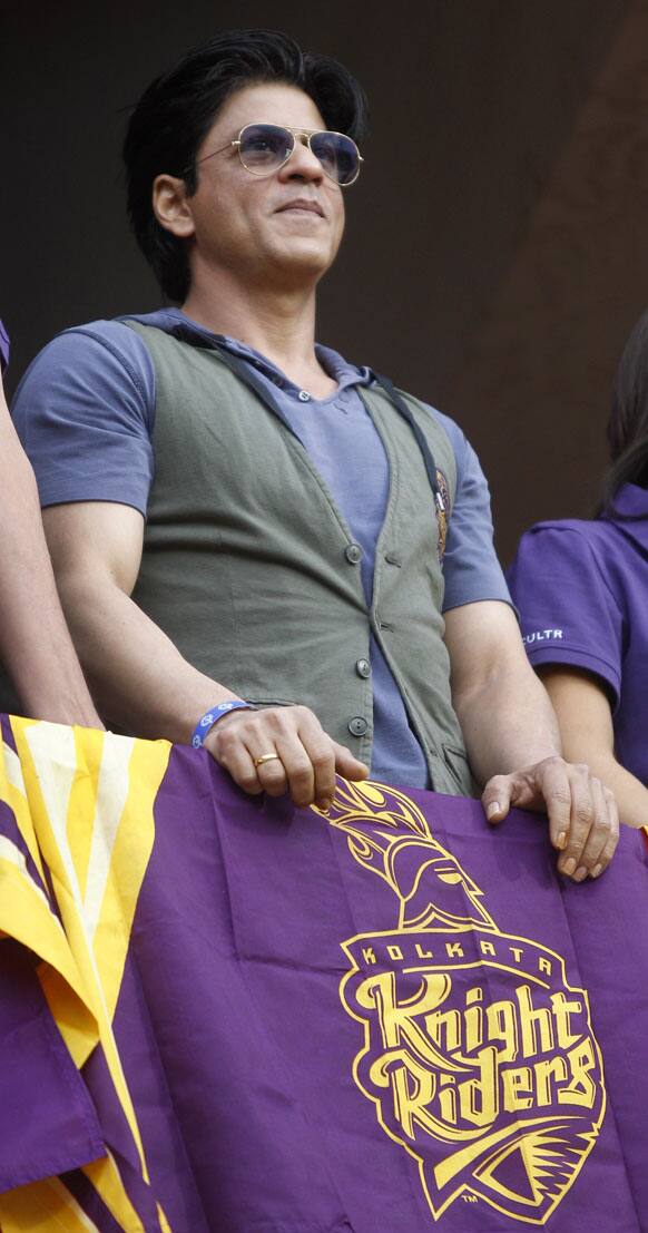 Bollywood actor and Kolkata Knight Riders team owner Shahrukh Khan watches the Indian Premier League (IPL) cricket match between Royal Challengers Bangalore and Kolkata Knight Riders in Bangalore.