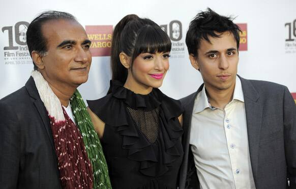 Iqbal Theba, Hannah Simone and director/producer Nicholas Bruckman pose together at the opening night of the 10th Annual Indian Film Festival of Los Angeles.