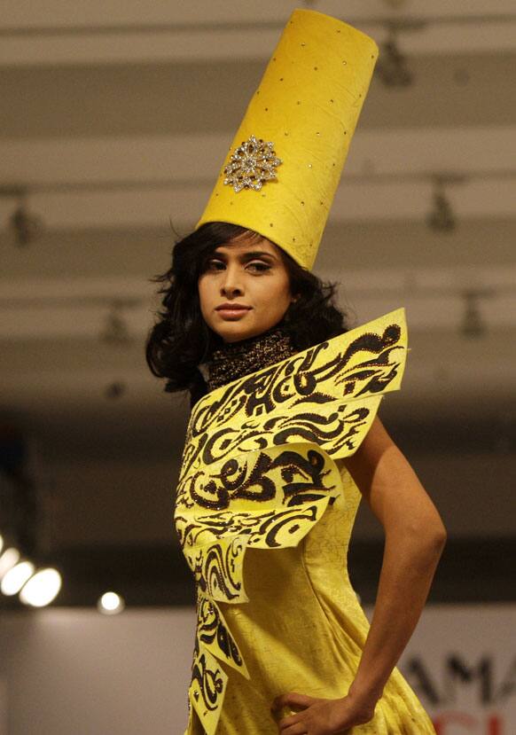 A model presents a creation of Fashion Era designers during Islamabad Fashion Week.