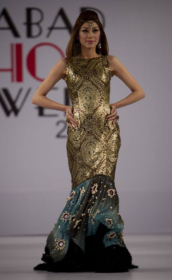 A model presents a creation of Gift University designers during a Fashion Week, in Islamabad.