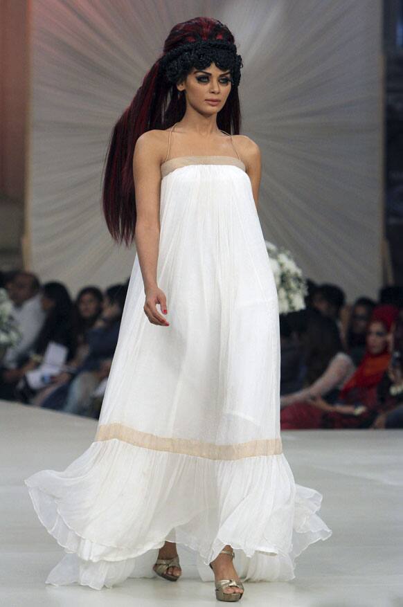 A model presents a creation by Pakistani designers Misbah and Saba, during Bridal Couture Week in Karachi.