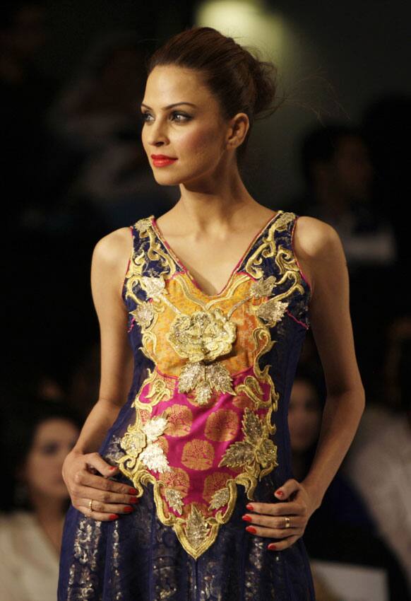 A Pakistani model presents a creation of Pakistani designer Mohsin Ali, during PFDC Sunsilk Fashion Week, in Lahore.