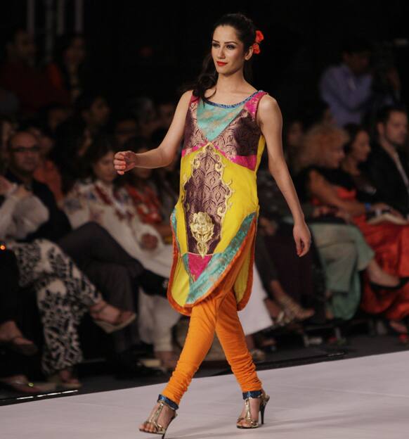 A Pakistani model presents a creation of Pakistani designer Mohsin Ali, during PFDC Sunsilk Fashion Week, in Lahore.