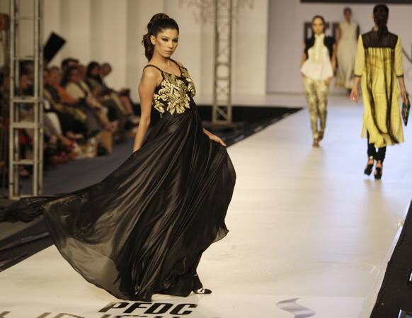 A Pakistani model presents a creation by Pakistani designer Zonia Anwaar, during PFDC Sunsilk Fashion Week, in Lahore.