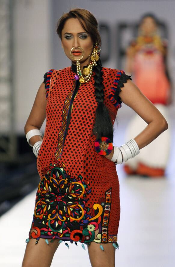 A Pakistani model presents a creation by Pakistani designer Hammad Ur Rehman, during PFDC Sunsilk Fashion Week, in Lahore, Pakistan.