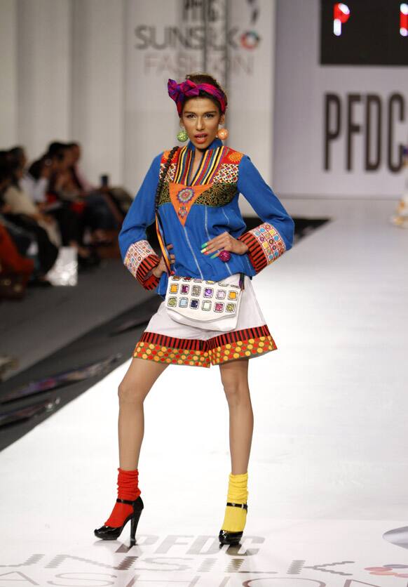 A Pakistani model presents a creation by Pakistani designer Karma, during PFDC Sunsilk Fashion Week, in Lahore, Pakistan.