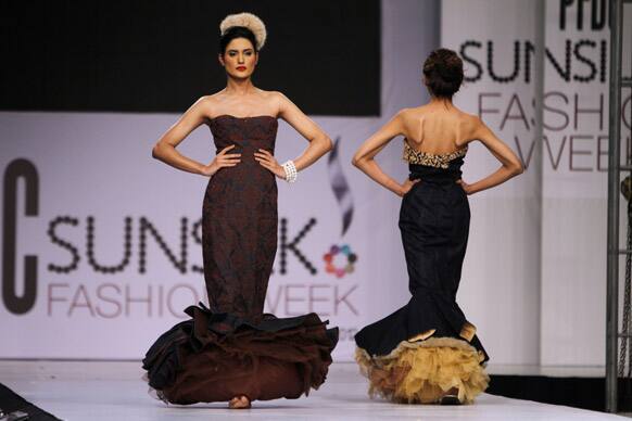 Pakistani models present creations by the Pakistan Institute of Fashion and Design during PFDC Sunsilk Fashion Week, in Lahore, Pakistan.