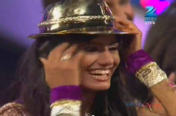 Rajasmita is all smiles with the winner's hat on her head.