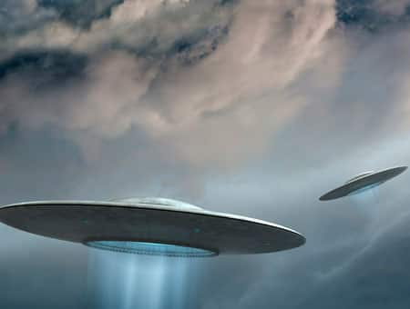 Mysterious flying saucer-shaped object spotted hovering over UK college ...