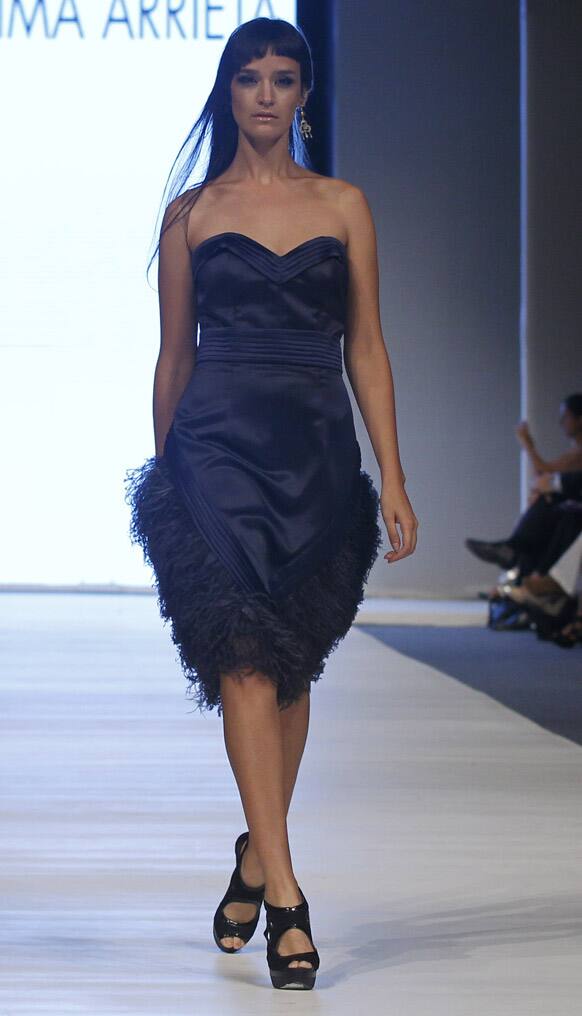 A model wears a creation by Peru's Fatima Arrieta during the second edition of the Lima Fashion Week.