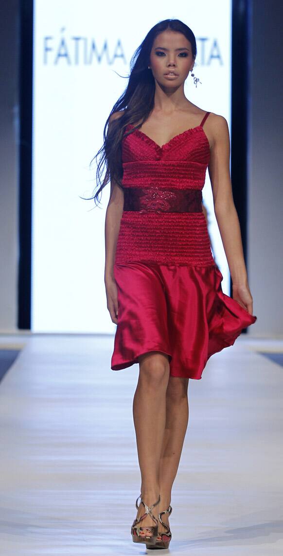 A model wears a creation by Peru's Fatima Arrieta during the second edition of the Lima Fashion Week.