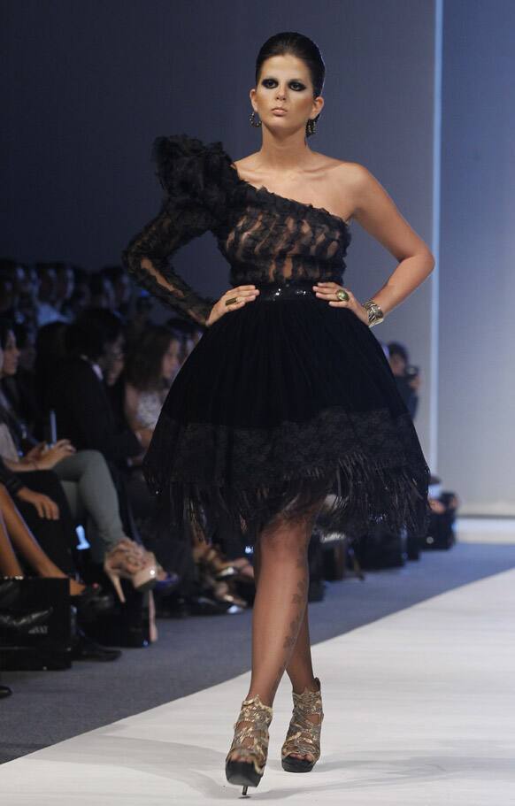 A model wears a creation by Peru's Gerardo Privat during the second edition of the Lima Fashion Week.