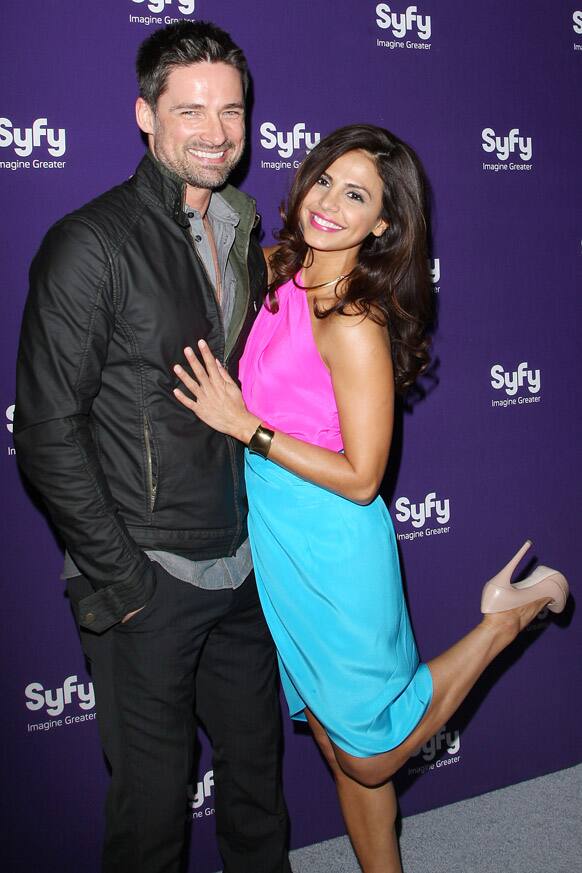 Actors Warren Christie, left, and Azita Ghanizada from the series,