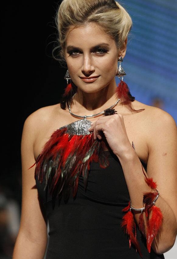 A model wears a creation by Peru's Roxana Rivero jewellery designers during the second edition of the Lima Fashion Week in Lima, Peru.