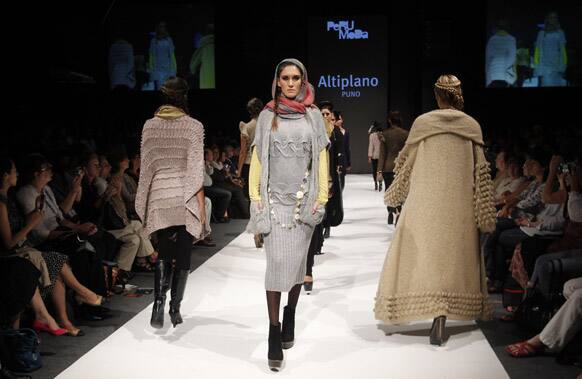 Models wear creations by Argentina's Laura Novik during the second edition of Lima Fashion Week in Lima.