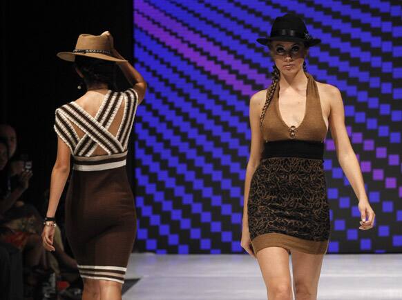 Models wear creations by Peru's Yanira Cardenas during the second edition of Lima Fashion Week in Lima.