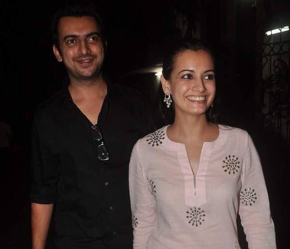 Dia Mirza walks in with beau Sahil Sangha for the screening of 'Tezz'.