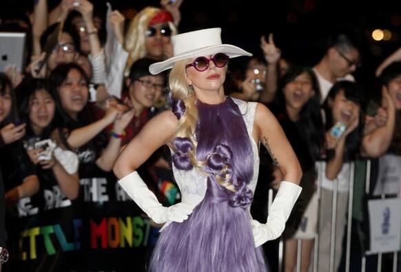 US pop singer Lady Gaga poses in front of her fans at a hotel in Hong Kong.