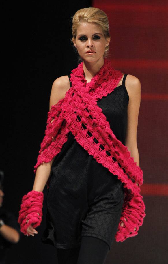 A model wears a creation by Peru's Henry Vela in the second edition of Lima Fashion Week.