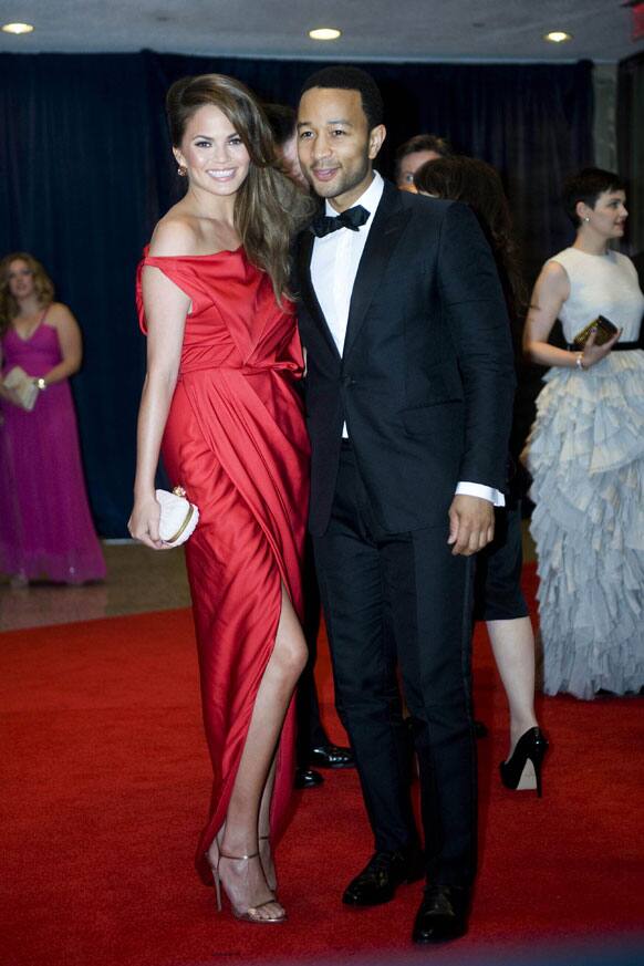 John Legend and Chrissy Teigen arrive at the White House Correspondents' Association Dinner in Washington.