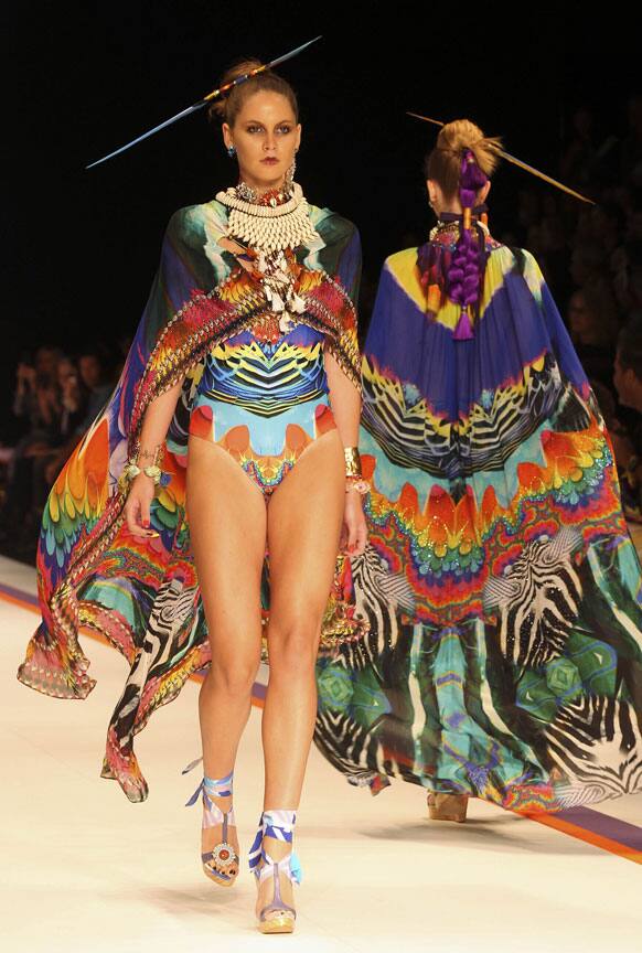 Models wear outfits from designer Camilla during Fashion Week Australia in Sydney.