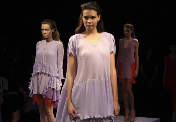 Models wear creations designed by Sara Phillips during Fashion Week Australia in Sydney.