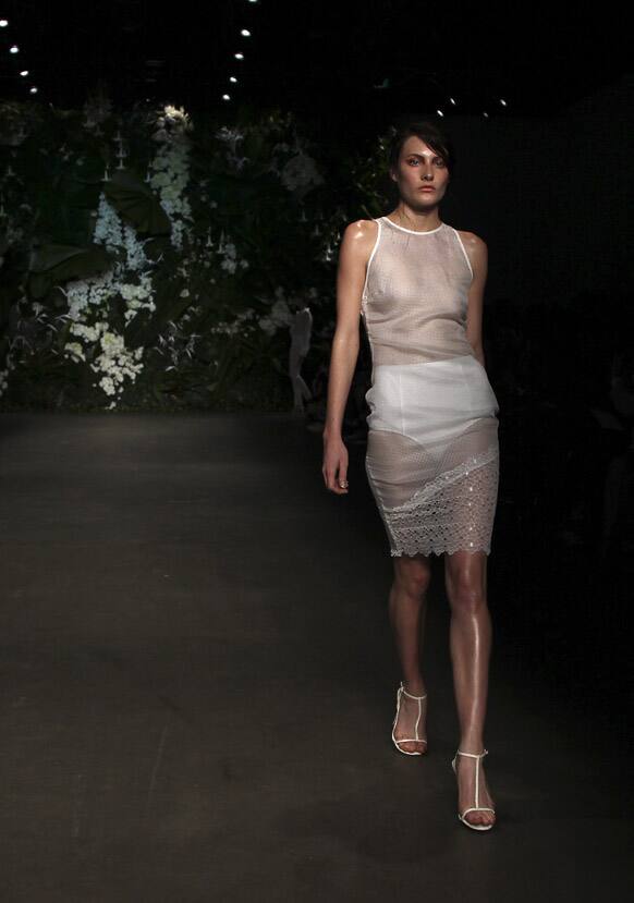 A model wearing designs from Bec & Bridge struts along the runway during Fashion Week Australia in Sydney.