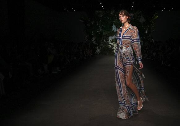 A model wearing designs from Bec & Bridge struts along the runway during Fashion Week Australia in Sydney.