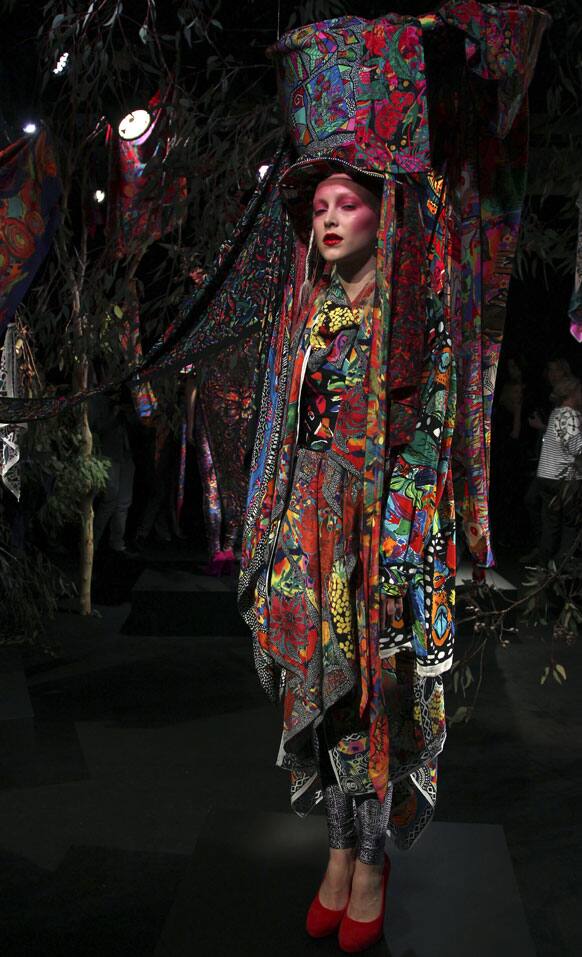 A model wearing designs by Jenny Lee stands in a display during Australian Fashion Week in Sydney.